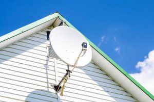Pay TV satellite dish installed on an Australian home.